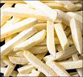 picture of frozen french fries in commercial restaurant freezer